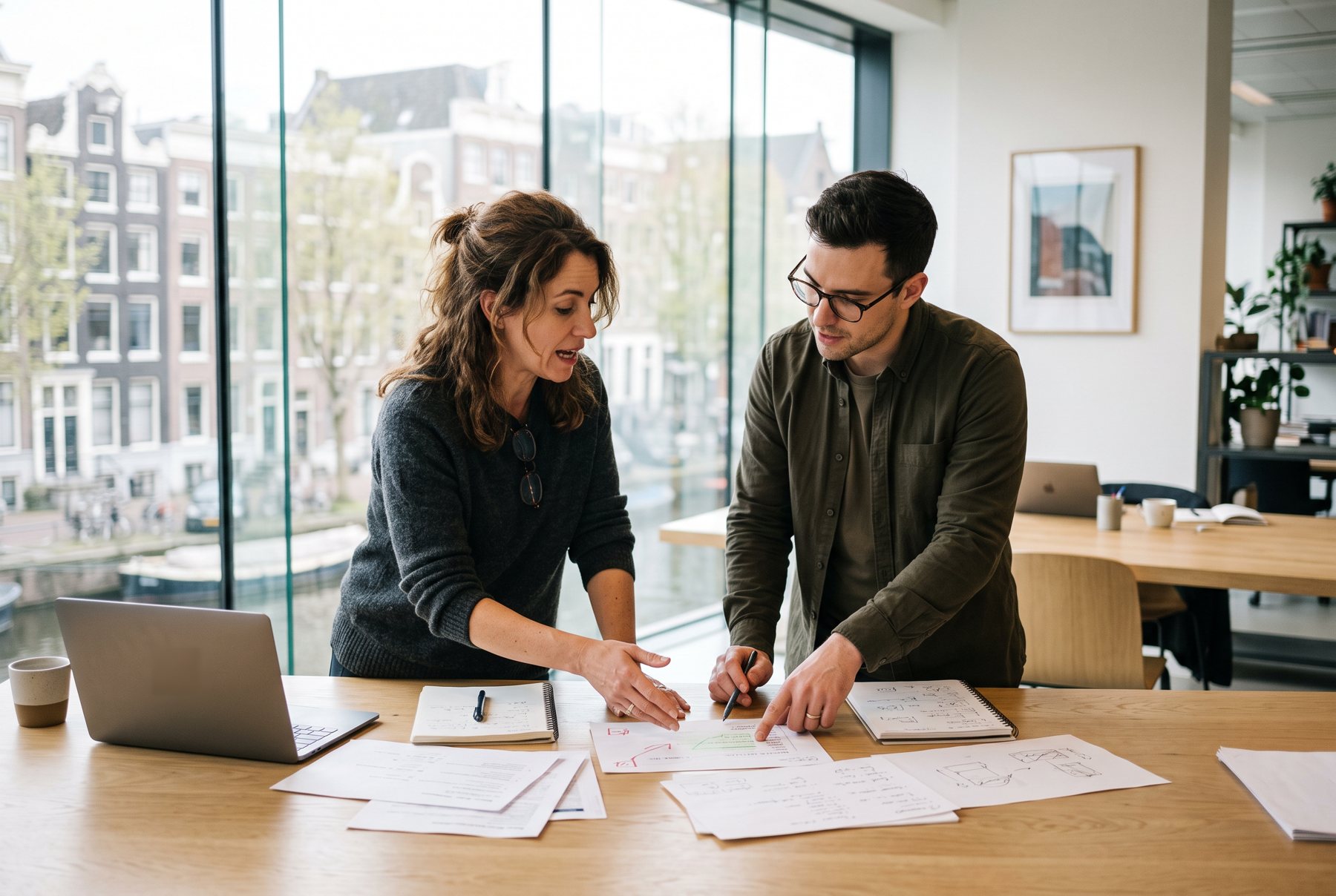 Two colleagues working through a decision together